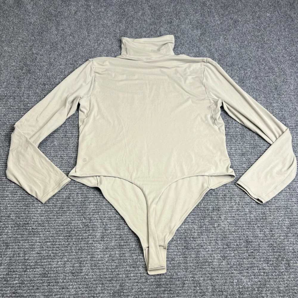 Lululemon Wundermost Ultra Soft Nulu Turtleneck Bodysuit Beige XL Long Sleeve